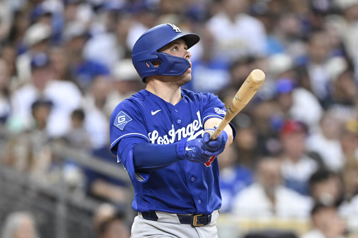 Jun 27, 2026; San Diego, California, USA; Los Angeles Dodgers catcher Dalton Rushing (68) hits a solo home run during the sixth inning against the San Diego Padres at Petco Park. Mandatory Credit: Denis Poroy-Imagn Images