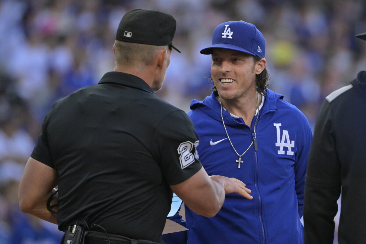 Jul 2, 2025; Los Angeles, California, USA;  Los Angeles Dodgers bench coach Danny Lehmann (0) talks with umpire Jim Wolf (28) prior to the game against the Chicago White Sox at Dodger Stadium. Mandatory Credit: Jayne Kamin-Oncea-Imagn Images