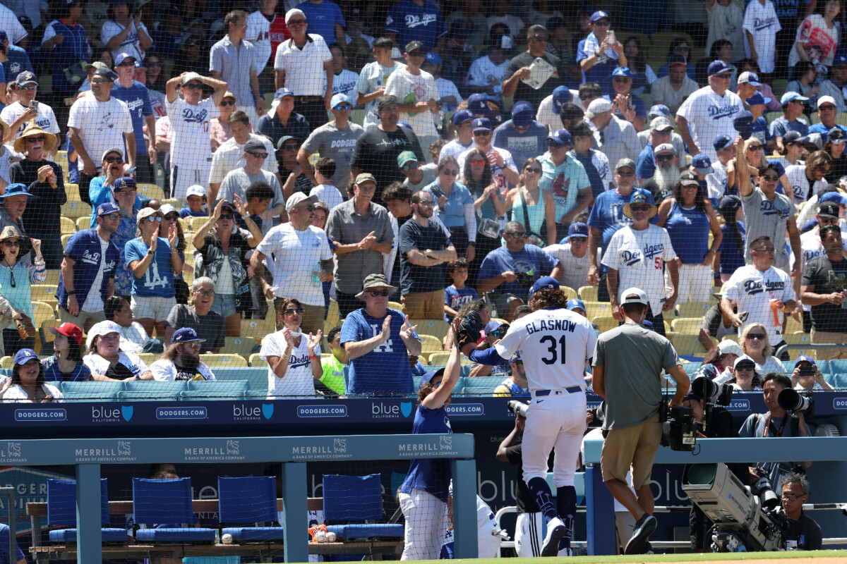 Jul 23, 2025; Los Angeles, California, USA; Los Angeles Dodgers starting pitcher Tyler Glasnow (31) receives standing ovation from fans after pitching seventh inning against the Minnesota Twins at Dodger Stadium. Mandatory Credit: Kiyoshi Mio-Imagn Images