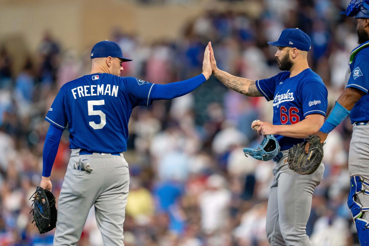 Jun 22, 2026; Minneapolis, Minnesota, USA; Los Angeles Dodgers first baseman Freddie Freeman (5) celebrates with Los Angeles Dodgers relief pitcher Tanner Scott (66) after defeating the Minnesota Twins at Target Field. Mandatory Credit: Jesse Johnson-Imagn Images