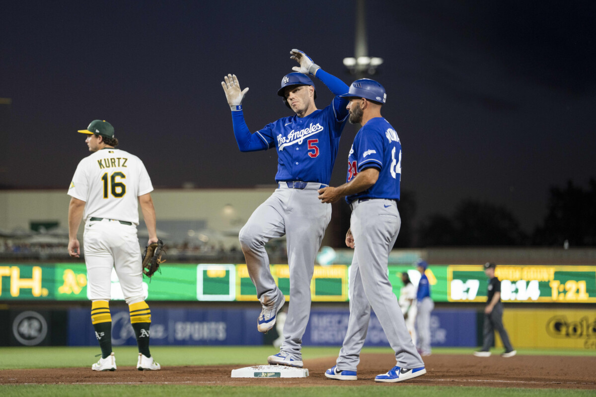 Jun 29, 2026; West Sacramento, California, USA; Los Angeles Dodgers first baseman Freddie Freeman (5) reacts after hitting an RBI single against the Athletics in the eighth inning at Sutter Health Park. Mandatory Credit: Cary Edmondson-Imagn Images