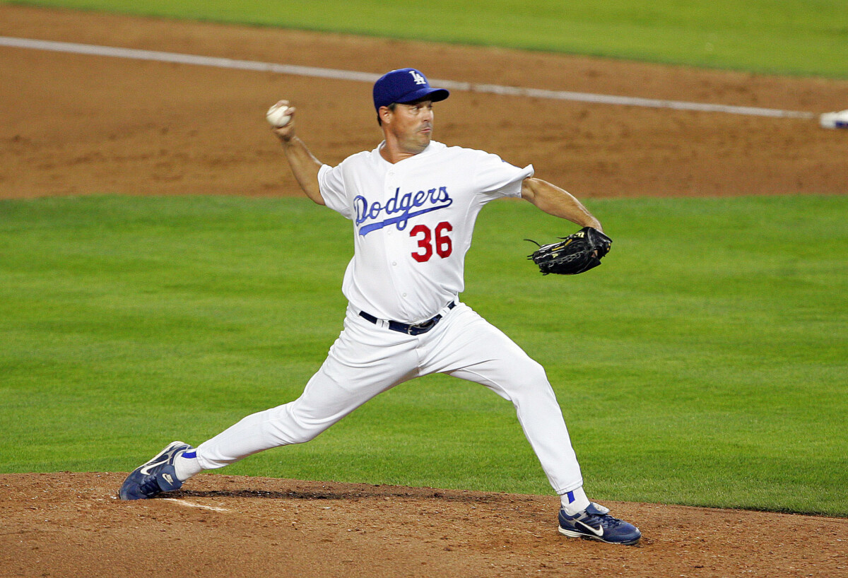 October 15, 2008; Los Angeles, CA, USA; Los Angeles Dodgers starting pitcher Greg Maddux (36) pitches in the fifth inning against the Philadelphia Phillies during game five of the NLCS at Dodger Stadium. Mandatory Credit: Gary A. Vasquez-USA TODAY Sports