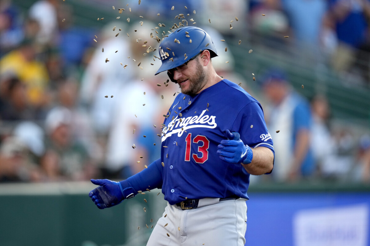 Jun 29, 2026; West Sacramento, California, USA; Los Angeles Dodgers third baseman Max Muncy (13) has sunflower seeds thrown on him after hitting a home run against the Athletics in the fourth inning at Sutter Health Park. Mandatory Credit: Cary Edmondson-Imagn Images