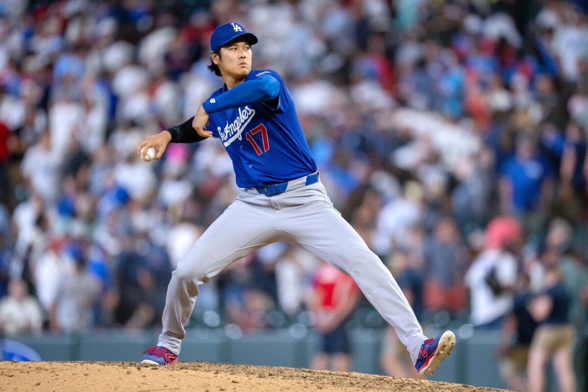 Jun 22, 2026; Minneapolis, Minnesota, USA; Los Angeles Dodgers designated hitter Shohei Ohtani (17) throws out a pitch after the game against the Minnesota Twins at Target Field. Mandatory Credit: Jesse Johnson-Imagn Images