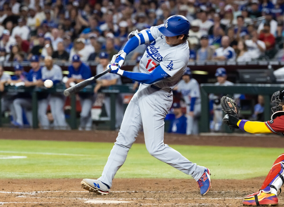 Jun 3, 2026; Phoenix, Arizona, USA; Los Angeles Dodgers designated hitter Shohei Ohtani hits a single in the fifth inning against the Arizona Diamondbacks at Chase Field. Mandatory Credit: Mark J. Rebilas-Imagn Images