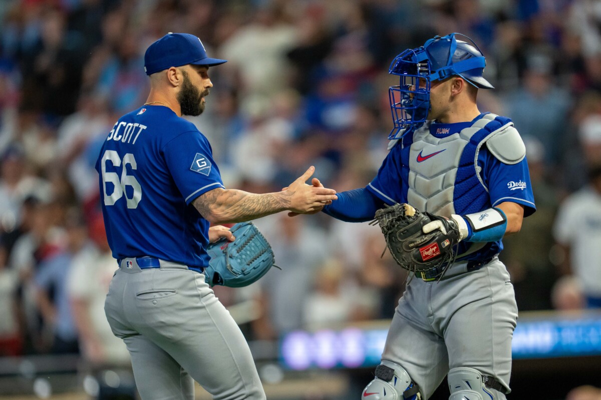 Jun 24, 2026; Minneapolis, Minnesota, USA; Los Angeles Dodgers relief pitcher Tanner Scott (66) celebrates with catcher Dalton Rushing (68) after defeating the Minnesota Twins at Target Field. Mandatory Credit: Jesse Johnson-Imagn Images