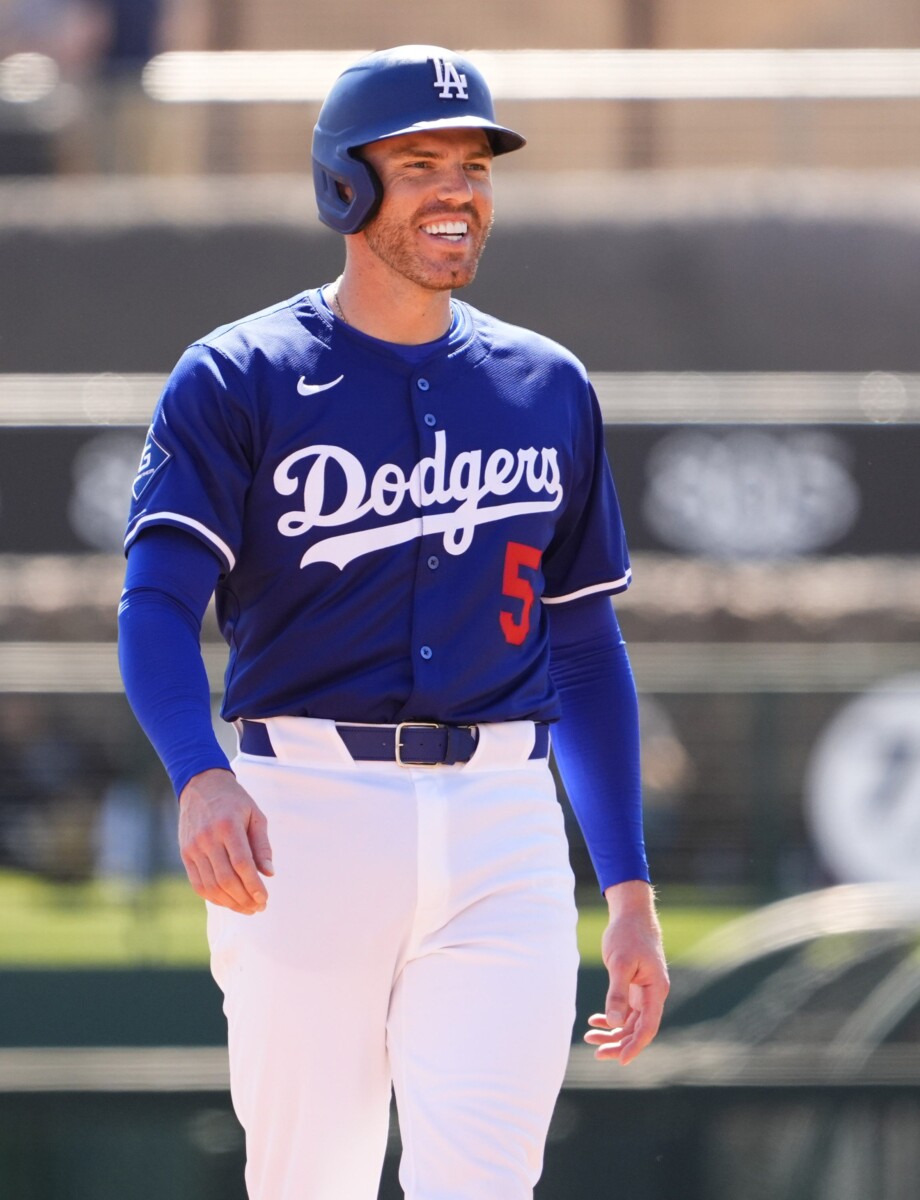 Los Angeles Dodgers Freddie Freeman smiles after hitting a 2-RBI double off Arizona Diamondbacks pitcher John Curtiss in the first inning during a spring training game at Camelback Ranch-Glendale in Phoenix on March 10, 2025.