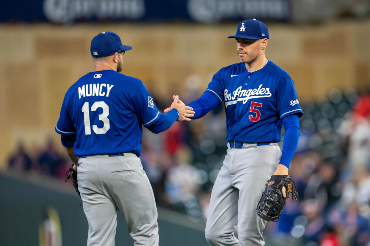 Jun 23, 2026; Minneapolis, Minnesota, USA; Los Angeles Dodgers third baseman Max Muncy (13) and first baseman Freddie Freeman (5) after defeating the Minnesota Twins at Target Field. Mandatory Credit: Jesse Johnson-Imagn Images