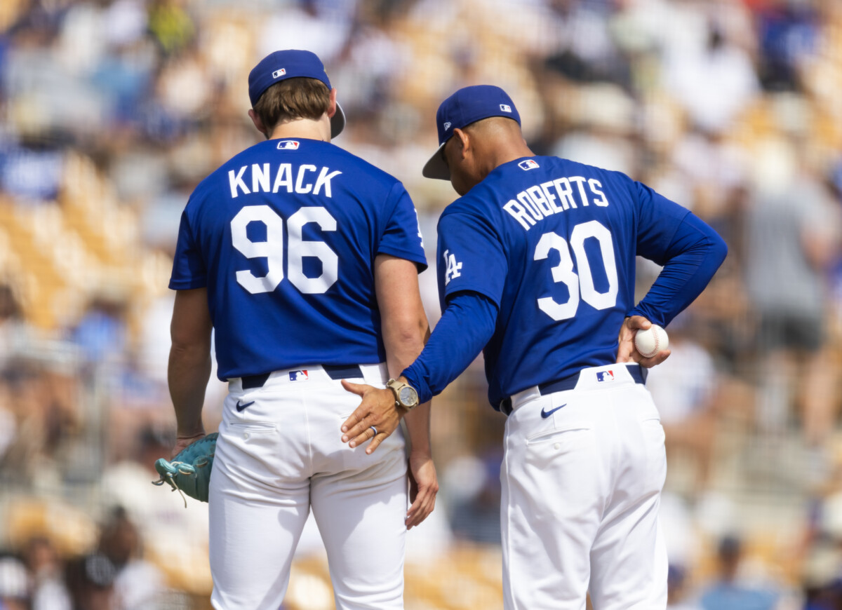 Mar 1, 2026; Phoenix, Arizona, USA; Los Angeles Dodgers pitcher Landon Knack (96) is pulled from the game by manager Dave Roberts against the Los Angeles Angels during a spring training game at Camelback Ranch-Glendale. Mandatory Credit: Mark J. Rebilas-Imagn Images
