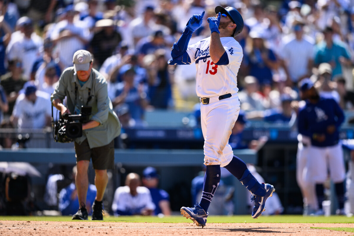 May 31, 2026; Los Angeles, California, USA; Los Angeles Dodgers third baseman Max Muncy (13) gestures after hitting a home run during the seventh inning against the Philadelphia Phillies at Dodger Stadium. Mandatory Credit: William Liang-Imagn Images