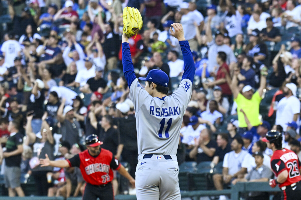 Jun 12, 2026; Chicago, Illinois, USA; Los Angeles Dodgers pitcher Roki Sasaki (11) reacts after Chicago White Sox designated hitter Andrew Benintendi (23) hits a home run during the first inning at Rate Field. Mandatory Credit: Matt Marton-Imagn Images