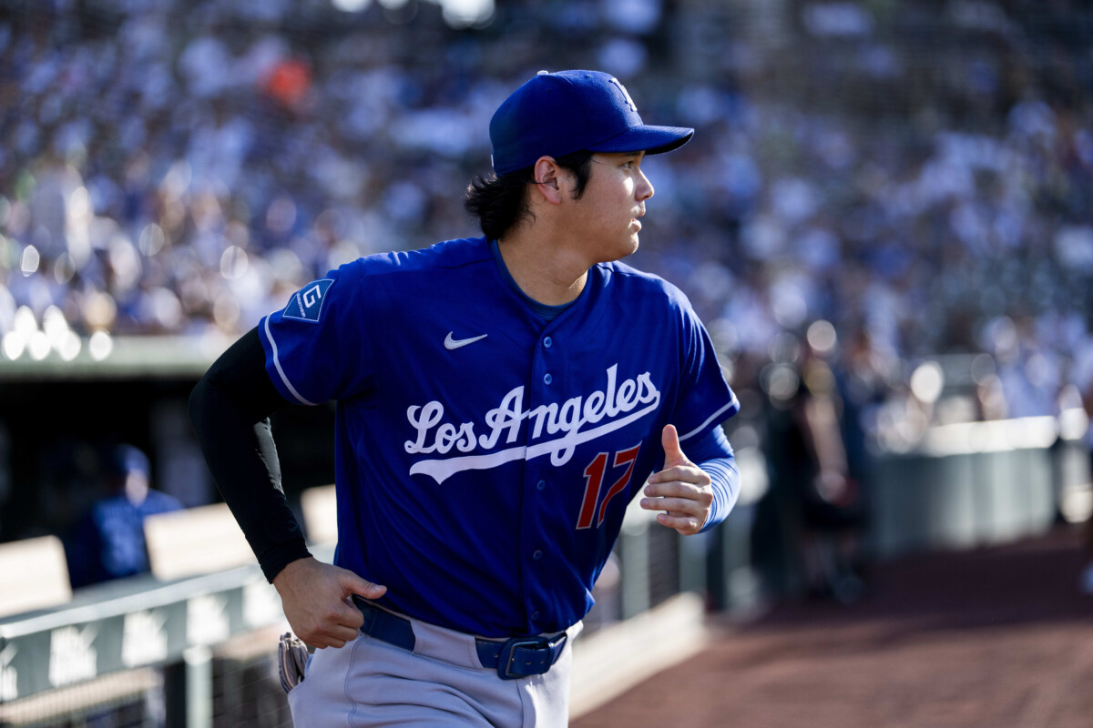 Jun 29, 2026; West Sacramento, California, USA; Los Angeles Dodgers designated hitter Shohei Ohtani (17) jogs onto the field before the start of a game against the Athletics at Sutter Health Park. Mandatory Credit: Cary Edmondson-Imagn Images