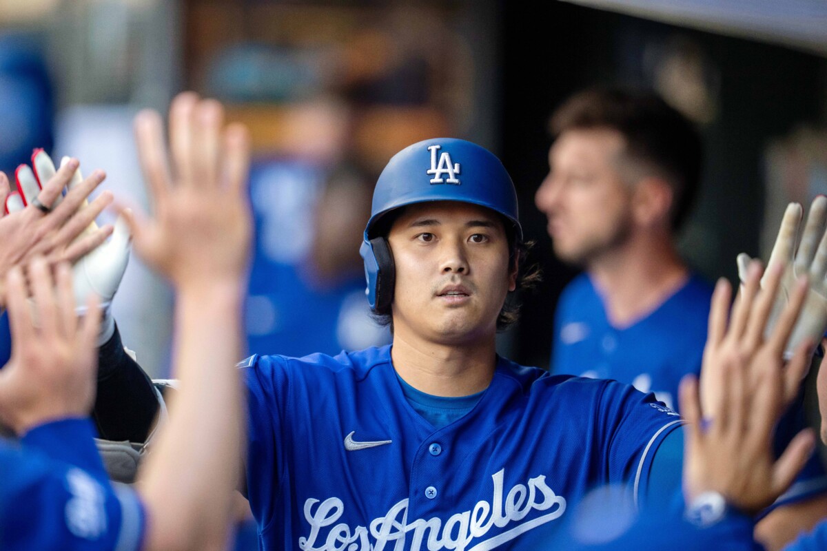 Jun 22, 2026; Minneapolis, Minnesota, USA; Los Angeles Dodgers designated hitter Shohei Ohtani (17) celebrates with teammates after hitting a solo home run against the Minnesota Twins in the first inning at Target Field. Mandatory Credit: Jesse Johnson-Imagn Images