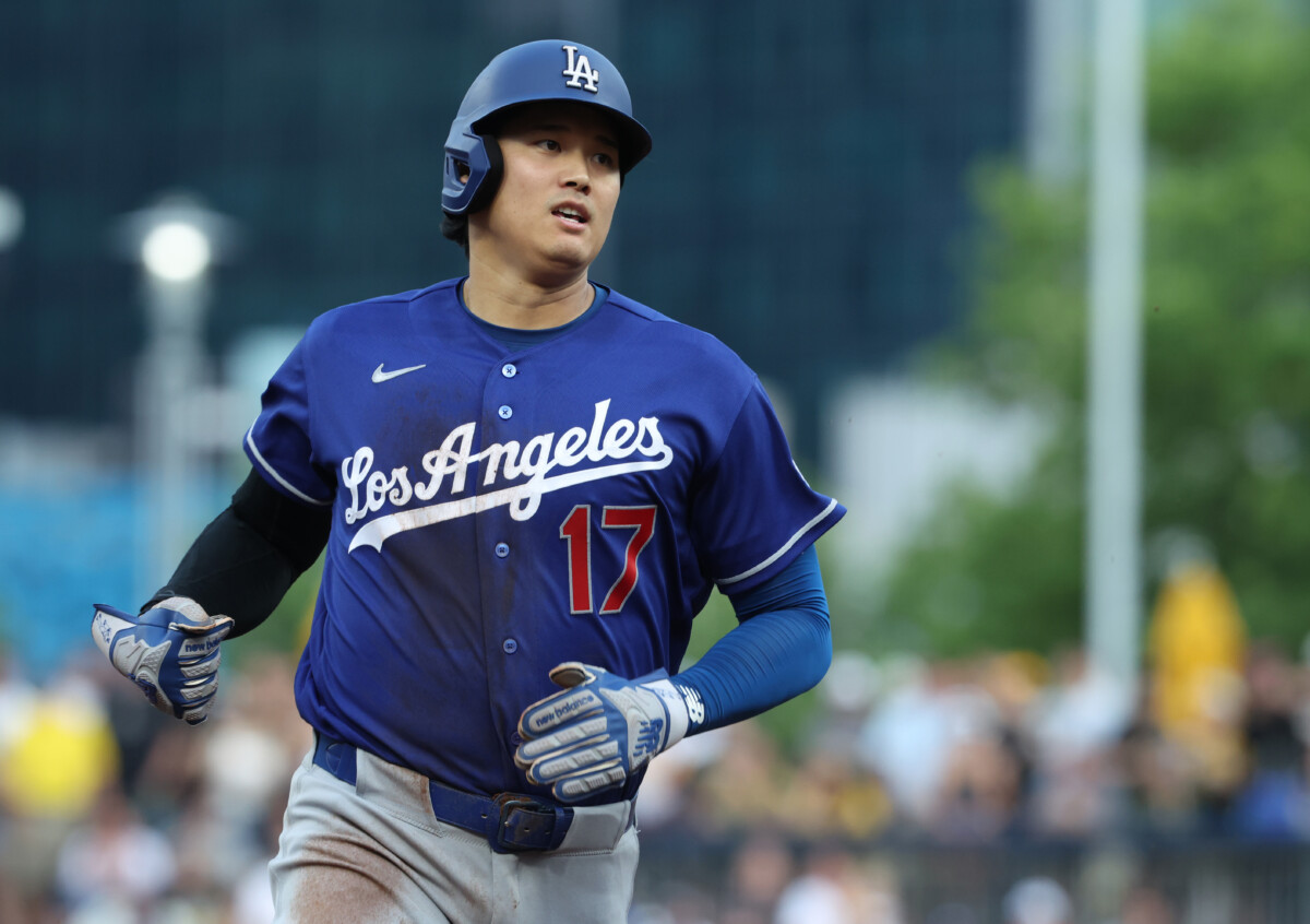 Jun 11, 2026; Pittsburgh, Pennsylvania, USA; Los Angeles Dodgers designated hitter Shohei Ohtani (17) advances to third base on a hit and run against the Pittsburgh Pirates during the fourth inning at PNC Park. Mandatory Credit: Charles LeClaire-Imagn Images