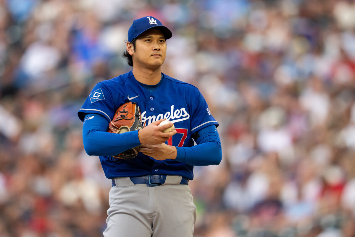 Jun 24, 2026; Minneapolis, Minnesota, USA; Los Angeles Dodgers starting pitcher Shohei Ohtani (17) looks on before delivering a pitch against the Minnesota Twins in the first inning at Target Field. Mandatory Credit: Jesse Johnson-Imagn Images