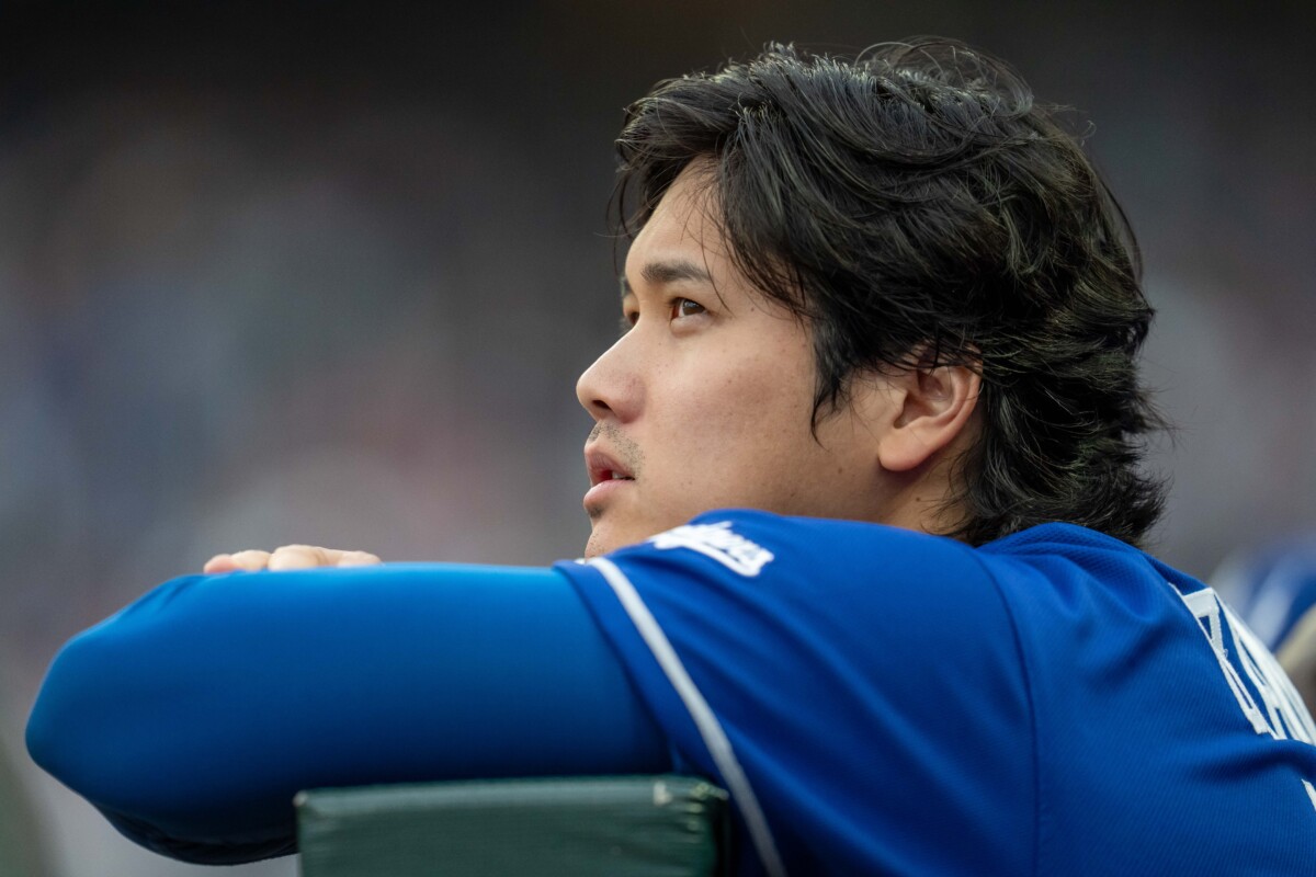 Jun 23, 2026; Minneapolis, Minnesota, USA; Los Angeles Dodgers designated hitter Shohei Ohtani (17) looks on from the dugout against the Minnesota Twins in the fourth inning at Target Field. Mandatory Credit: Jesse Johnson-Imagn Images