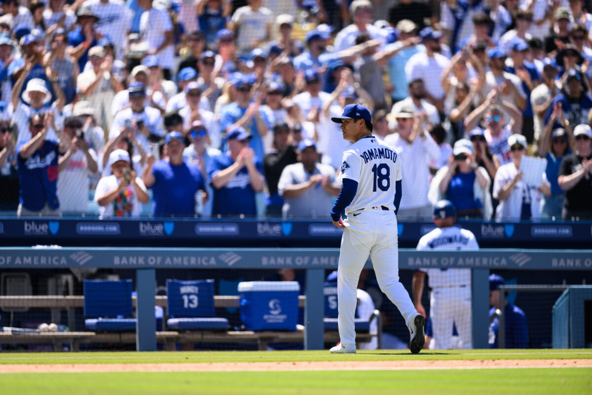 May 31, 2026; Los Angeles, California, USA; Los Angeles Dodgers pitcher Yoshinobu Yamamoto (18) walks back to the dugout after a pitching change during the sixth inning against the Philadelphia Phillies at Dodger Stadium. Mandatory Credit: William Liang-Imagn Images