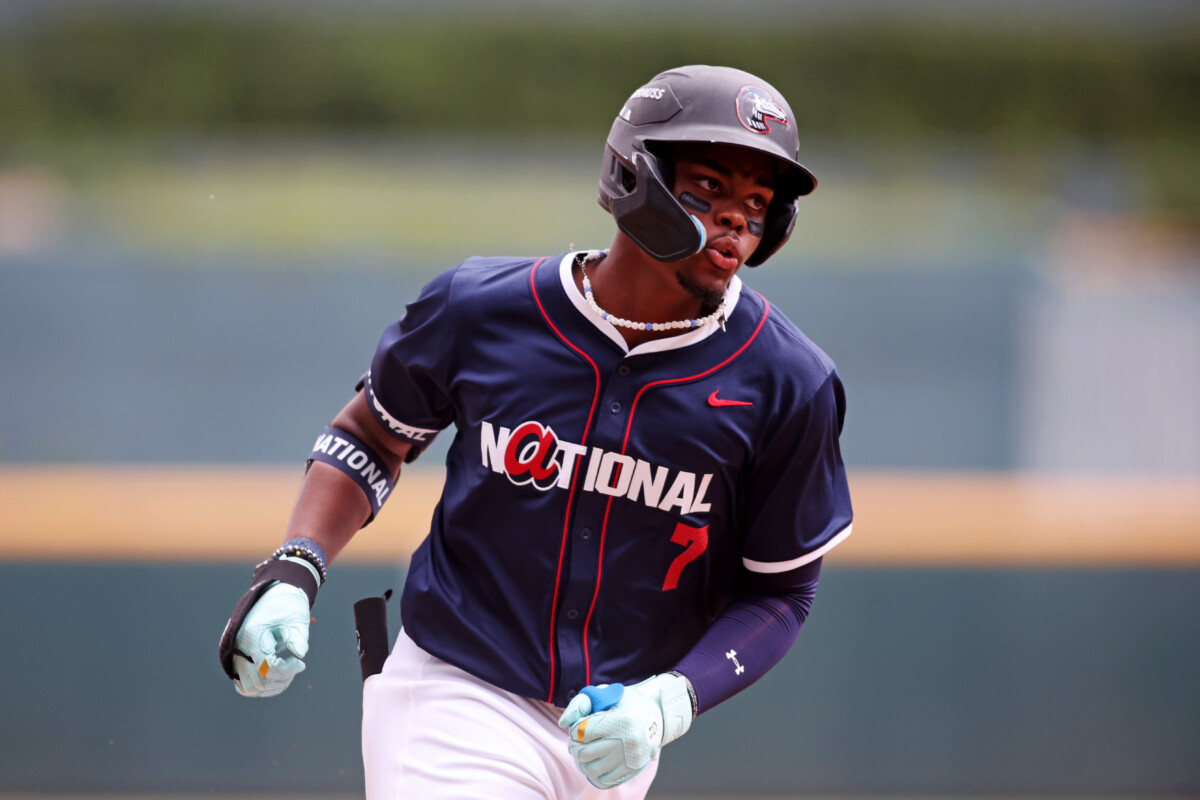 Jul 12, 2025; Atlanta, GA, USA; National League outfielder Josue De Paula (46) of the Los Angeles Dodgers scores a run during the sixth inning against American League at Truist Park. Mandatory Credit: Brett Davis-Imagn Images