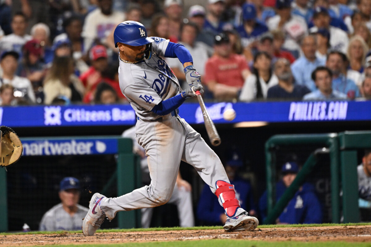 Jul 20, 2026; Philadelphia, Pennsylvania, USA; Los Angeles Dodgers shortstop Mookie Betts (50) hits a home run during the seventh inning against the Philadelphia Phillies at Citizens Bank Park. Mandatory Credit: Eric Hartline-Imagn Images