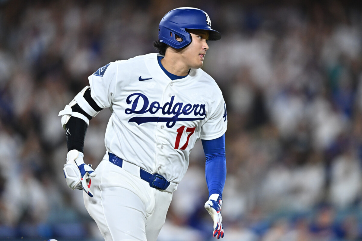Jul 28, 2026; Los Angeles, California, USA; Los Angeles Dodgers designated hitter Shohei Ohtani (17) runs after hitting a double during the ninth inning against the Seattle Mariners at Dodger Stadium. Mandatory Credit: William Liang-Imagn Images