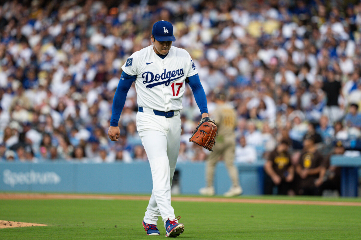 Jul 3, 2026; Los Angeles, California, USA; Los Angeles Dodgers two-way player Shohei Ohtani (17) returns to the dugout after pitching in the first inning against the San Diego Padres at Dodger Stadium. Mandatory Credit: Jon Endow-Imagn Images
