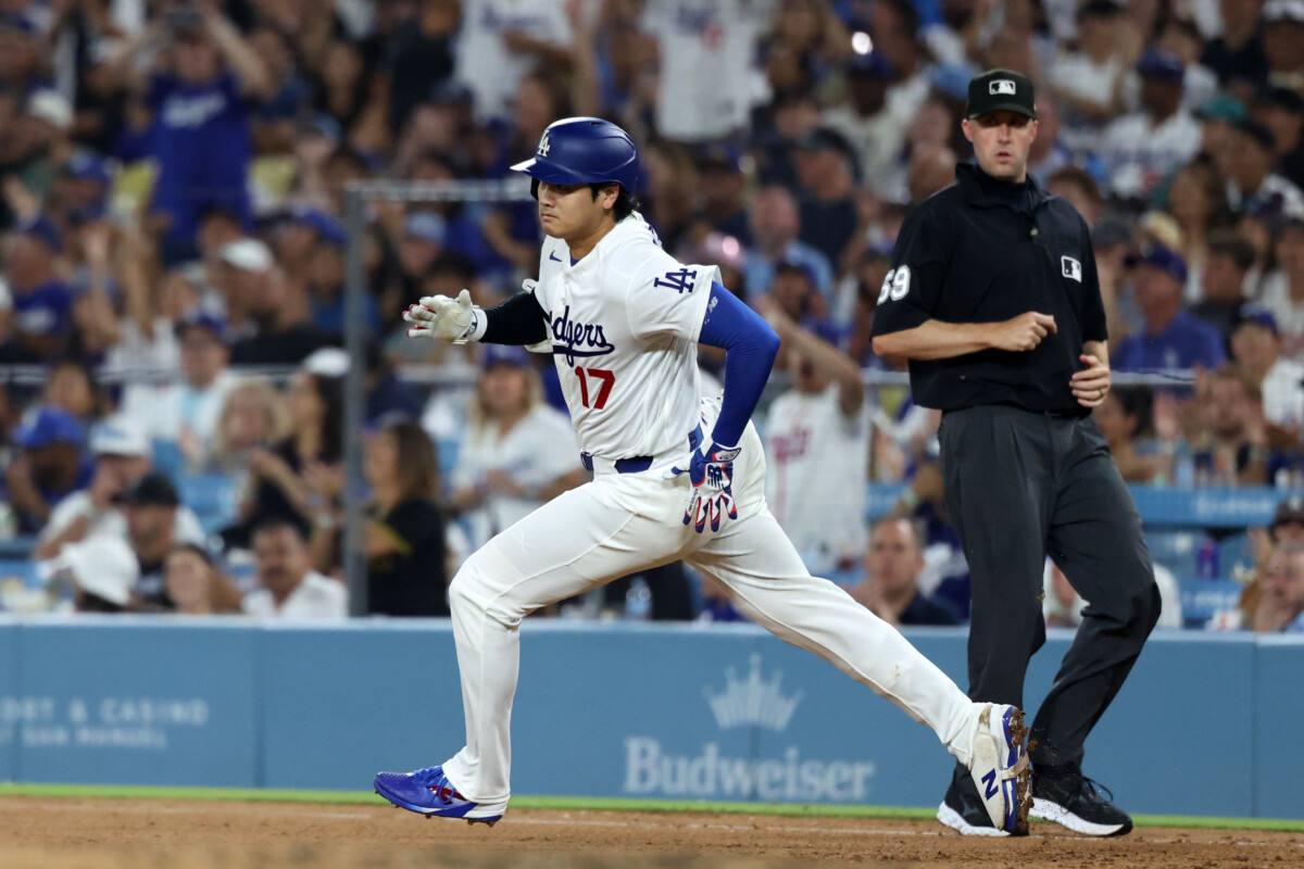 Jul 29, 2026; Los Angeles, California, USA; Los Angeles Dodgers two-way player Shohei Ohtani (17) runs to second on an RBI double during the sixth inning against the Seattle Mariners at Dodger Stadium. Mandatory Credit: Kiyoshi Mio-Imagn Images