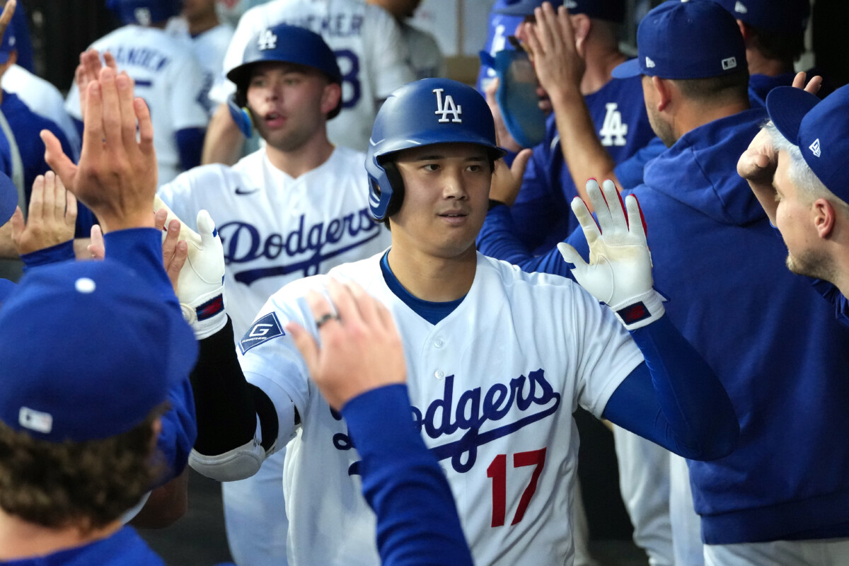Jul 6, 2026; Los Angeles, California, USA; Los Angeles Dodgers designated hitter Shohei Ohtani (17) celebrates in the dugout after scoring on a two run home run against the Colorado Rockies in the third inning at Dodger Stadium. Mandatory Credit: Kirby Lee-Imagn Images