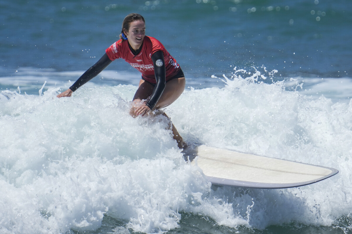 Aug 2, 2023; Huntington Beach, CA, USA; Rachael Tilly of the USA competes in the Huntington Beach Longboard Classic at the 2023 US Open of Surfing at the Huntington Beach Pier. Mandatory Credit: Robert Hanashiro-USA TODAY