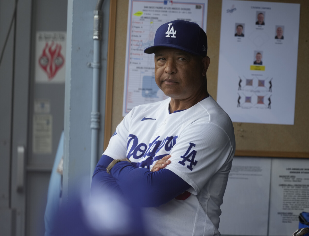 Jul 3, 2026; Los Angeles, California, USA; Los Angeles Dodgers manager Dave Roberts (30) stands in the dugout prior to a game against the San Diego Padres at Dodger Stadium. Mandatory Credit: Jon Endow-Imagn Images