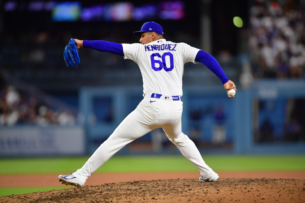 Jul 8, 2026; Los Angeles, California, USA; Los Angeles Dodgers pitcher Edgardo Henriquez (60) throws against the Colorado Rockies during the eighth inning at Dodger Stadium. Mandatory Credit: Gary A. Vasquez-Imagn Images