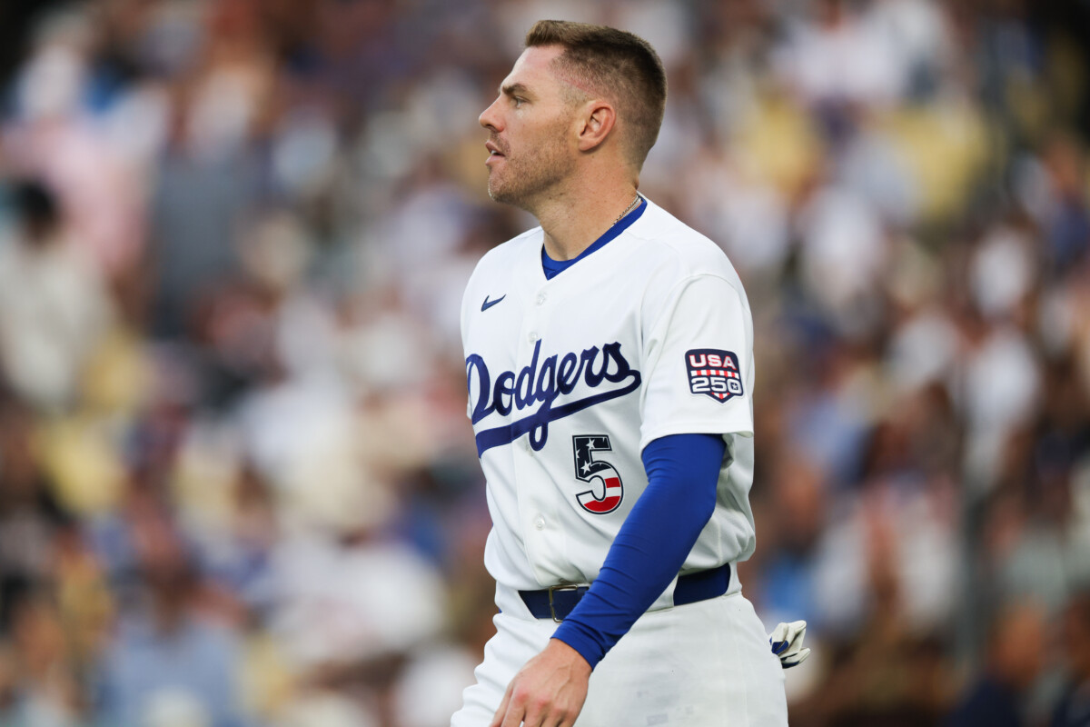 Jul 4, 2026; Los Angeles, California, USA; Los Angeles Dodgers first baseman Freddie Freeman (5) looks on after being tagged out at home in the first inning against the San Diego Padres at Dodger Stadium. Mandatory Credit: Kiyoshi Mio-Imagn Images