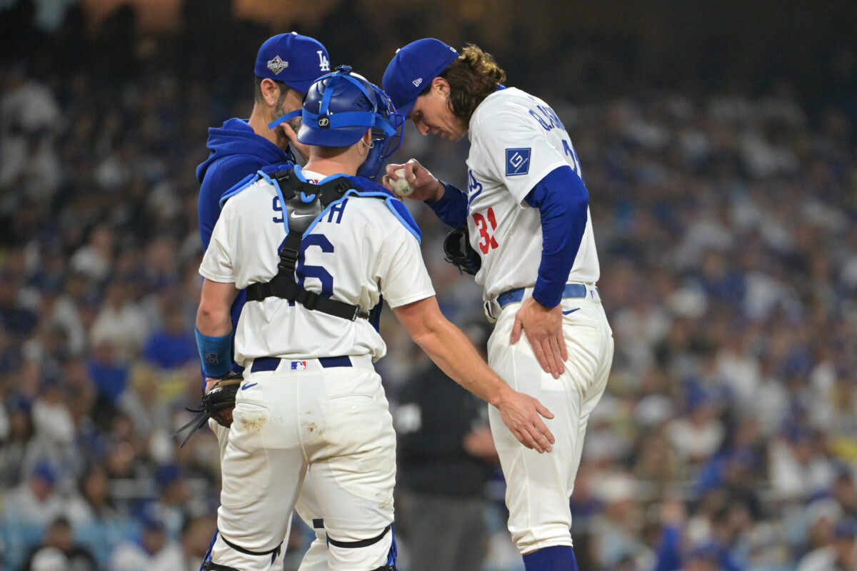 Oct 27, 2025; Los Angeles, California, USA; Los Angeles Dodgers pitcher Tyler Glasnow (31) meets on the mound with pitching coach Mark Prior (99) and catcher Will Smith (16) in the fourth inning against the Toronto Blue Jays during game three of the 2025 MLB World Series at Dodger Stadium. Mandatory Credit: Jayne Kamin-Oncea-Imagn Images