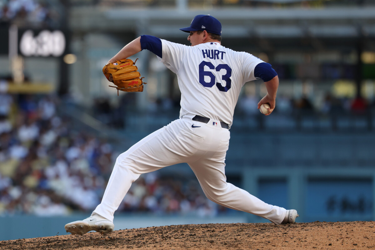 Jul 5, 2026; Los Angeles, California, USA; Los Angeles Dodgers pitcher Kyle Hurt (63) pitches in the seventh inning against the San Diego Padres at Dodger Stadium. Mandatory Credit: Kiyoshi Mio-Imagn Images