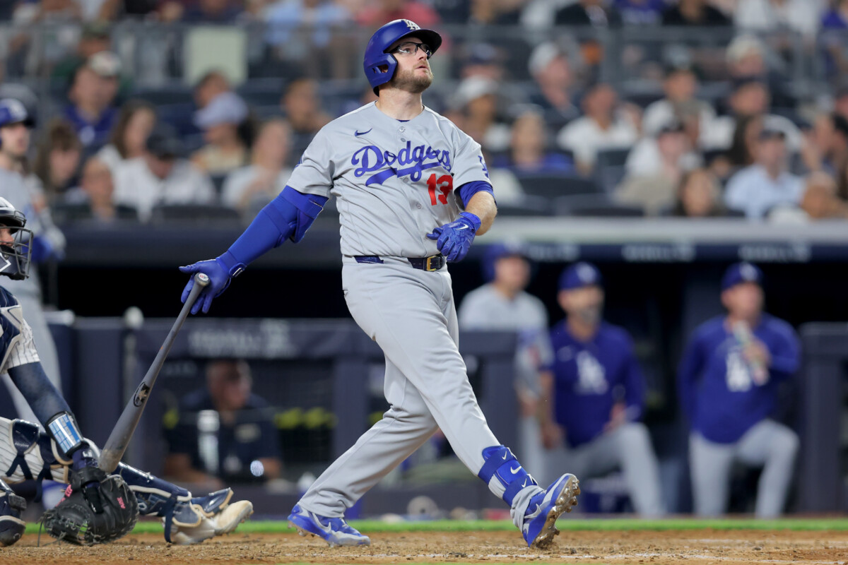 Jul 17, 2026; Bronx, New York, USA; Los Angeles Dodgers third baseman Max Muncy (13) follows through on a two run home run against the New York Yankees during the seventh inning at Yankee Stadium. Mandatory Credit: Brad Penner-Imagn Images