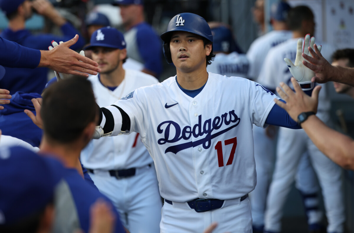 Jul 7, 2026; Los Angeles, California, USA; Los Angeles Dodgers designated hitter Shohei Ohtani (17) celebrates with teammates after hitting his 300th career home run during the first inning against the Colorado Rockies at Dodger Stadium. Mandatory Credit: Kiyoshi Mio-Imagn Images