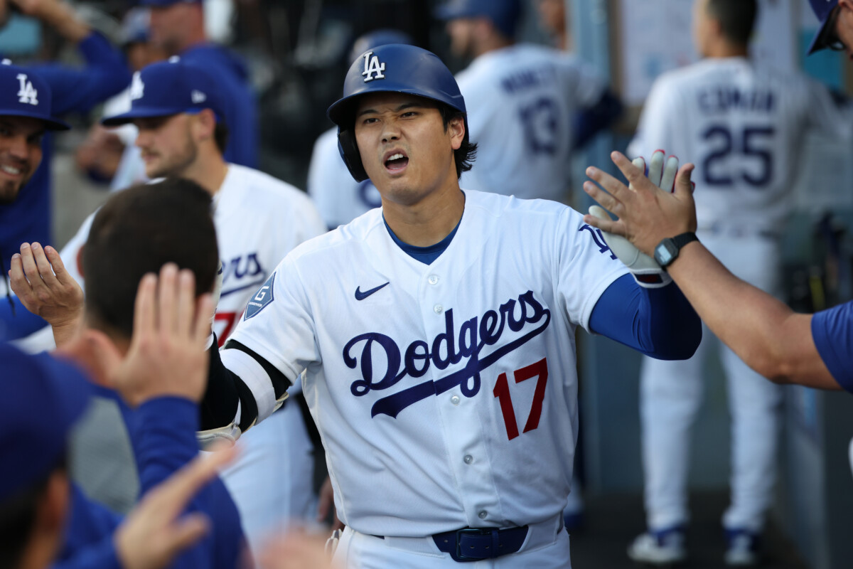 Jul 7, 2026; Los Angeles, California, USA; Los Angeles Dodgers designated hitter Shohei Ohtani (17) celebrates with teammates after hitting his 300th career home run during the first inning against the Colorado Rockies at Dodger Stadium. Mandatory Credit: Kiyoshi Mio-Imagn Images