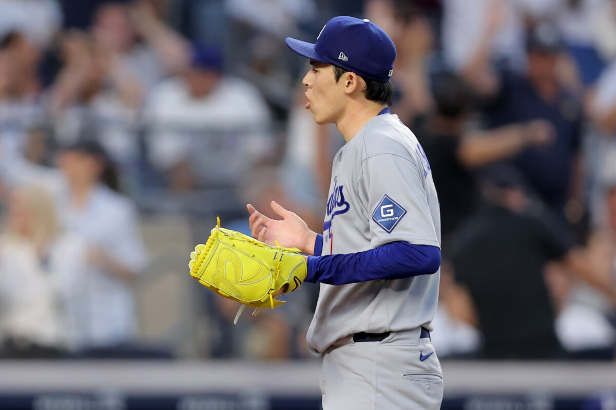 Jul 17, 2026; Bronx, New York, USA; Los Angeles Dodgers starting pitcher Roki Sasaki (11) reacts after the New York Yankees score on a passed ball by Dodgers catcher Dalton Rushing (not pictured) during the fourth inning at Yankee Stadium. Mandatory Credit: Brad Penner-Imagn Images