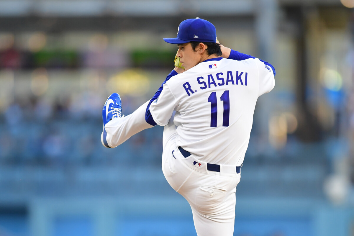 Jul 8, 2026; Los Angeles, California, USA; Los Angeles Dodgers pitcher R?ki Sasaki (11) pitches in the first inning against the Colorado Rockies at Dodger Stadium. Mandatory Credit: Gary A. Vasquez-Imagn Images