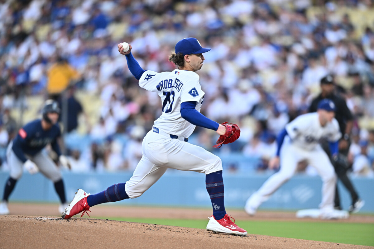 Jul 28, 2026; Los Angeles, California, USA;  Los Angeles Dodgers pitcher Justin Wrobleski (70) delivers a pitch during the first inning against the Seattle Mariners at Dodger Stadium. Mandatory Credit: William Liang-Imagn Images