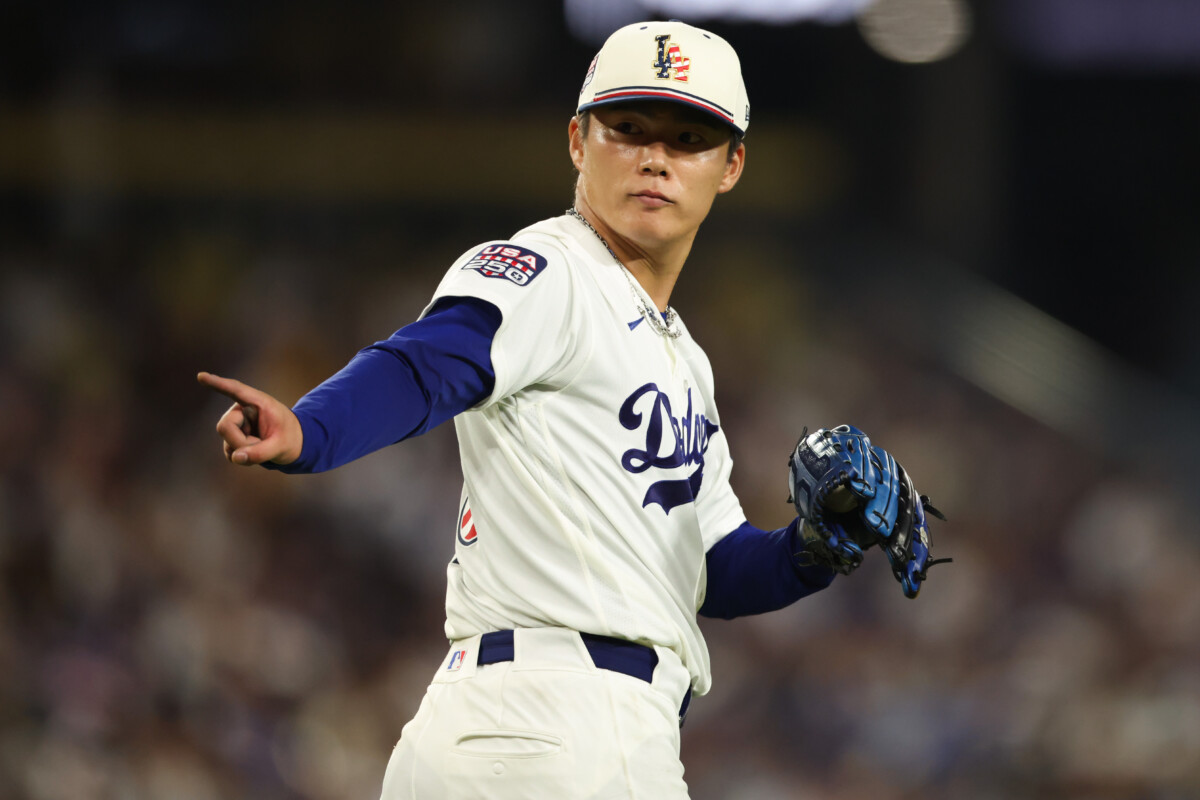 Jul 4, 2026; Los Angeles, California, USA; Los Angeles Dodgers pitcher Yoshinobu Yamamoto (18) reacts in the seventh inning against the San Diego Padres at Dodger Stadium. Mandatory Credit: Kiyoshi Mio-Imagn Images