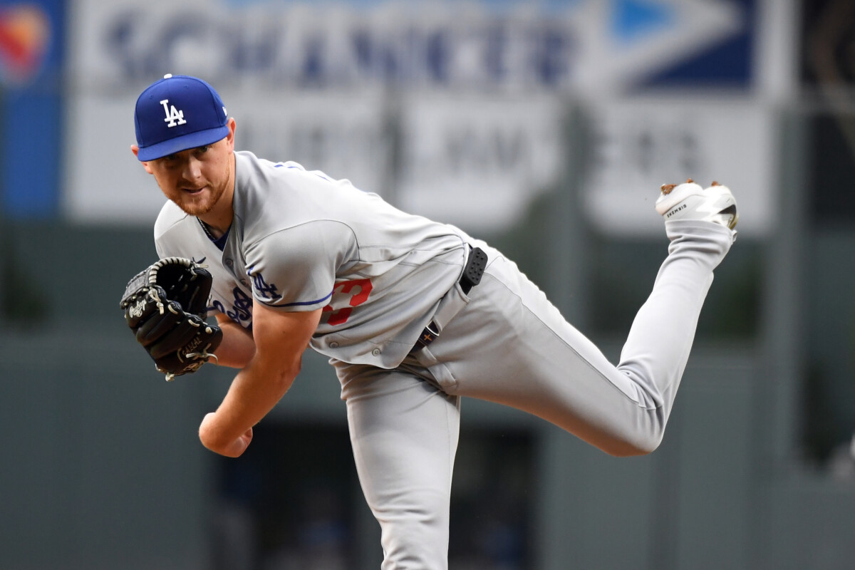 Aug 18, 2026; Denver, Colorado, USA; Los Angeles Dodgers pitcher Eric Lauer (33) pitches in the first inning against the Colorado Rockies at Coors Field. Mandatory Credit: Christopher Hanewinckel-Imagn Images