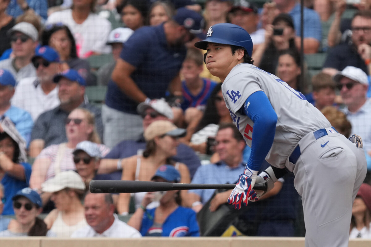 Aug 5, 2026; Chicago, Illinois, USA; Los Angeles Dodgers two-way player Shohei Ohtani (17) hits a single against the Chicago Cubs during the fifth inning at Wrigley Field. Mandatory Credit: David Banks-Imagn Images