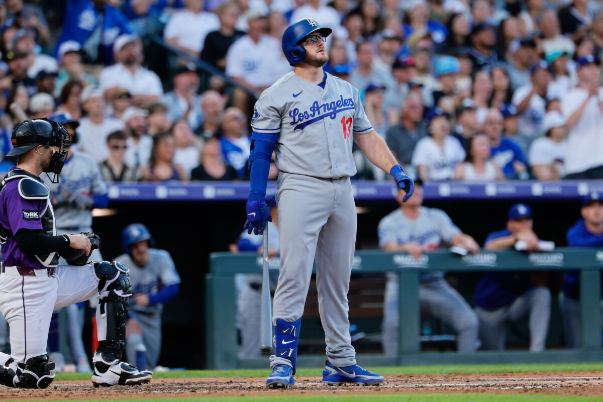 Aug 17, 2026; Denver, Colorado, USA; Los Angeles Dodgers third baseman Max Muncy (13) watches his ball on a three run home run in the third inning against the Colorado Rockies at Coors Field. Mandatory Credit: Isaiah J. Downing-Imagn Images