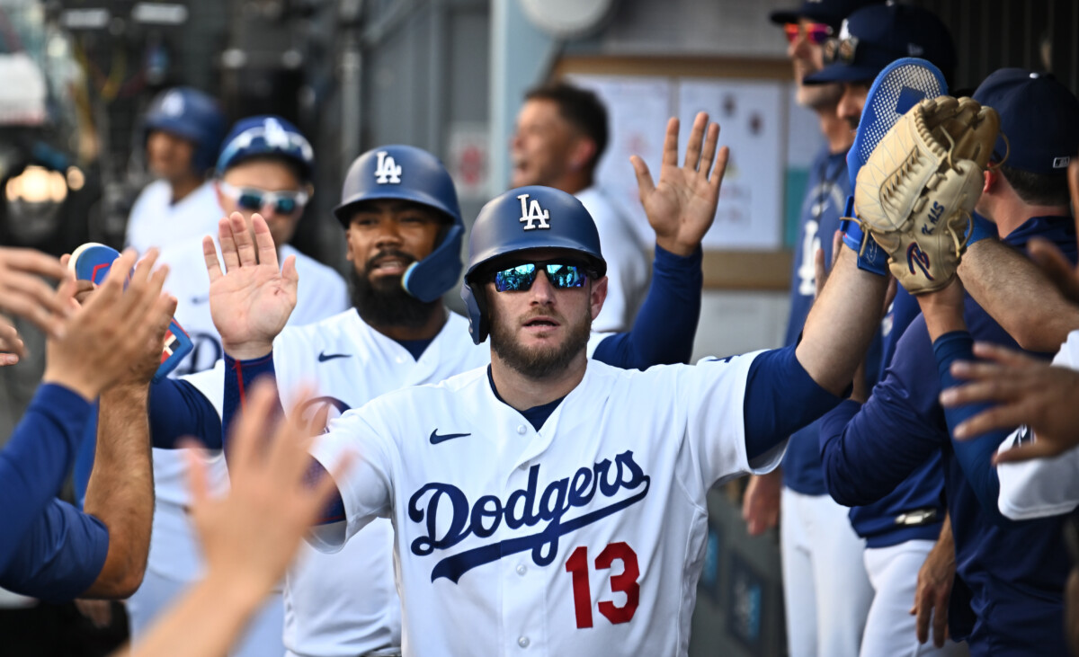 Aug 2, 2026; Los Angeles, California, USA; Los Angeles Dodgers third baseman Max Muncy (13) celebrates after a run during the second inning against the Boston Red Sox at Dodger Stadium. Mandatory Credit: Jonathan Hui-Imagn Images