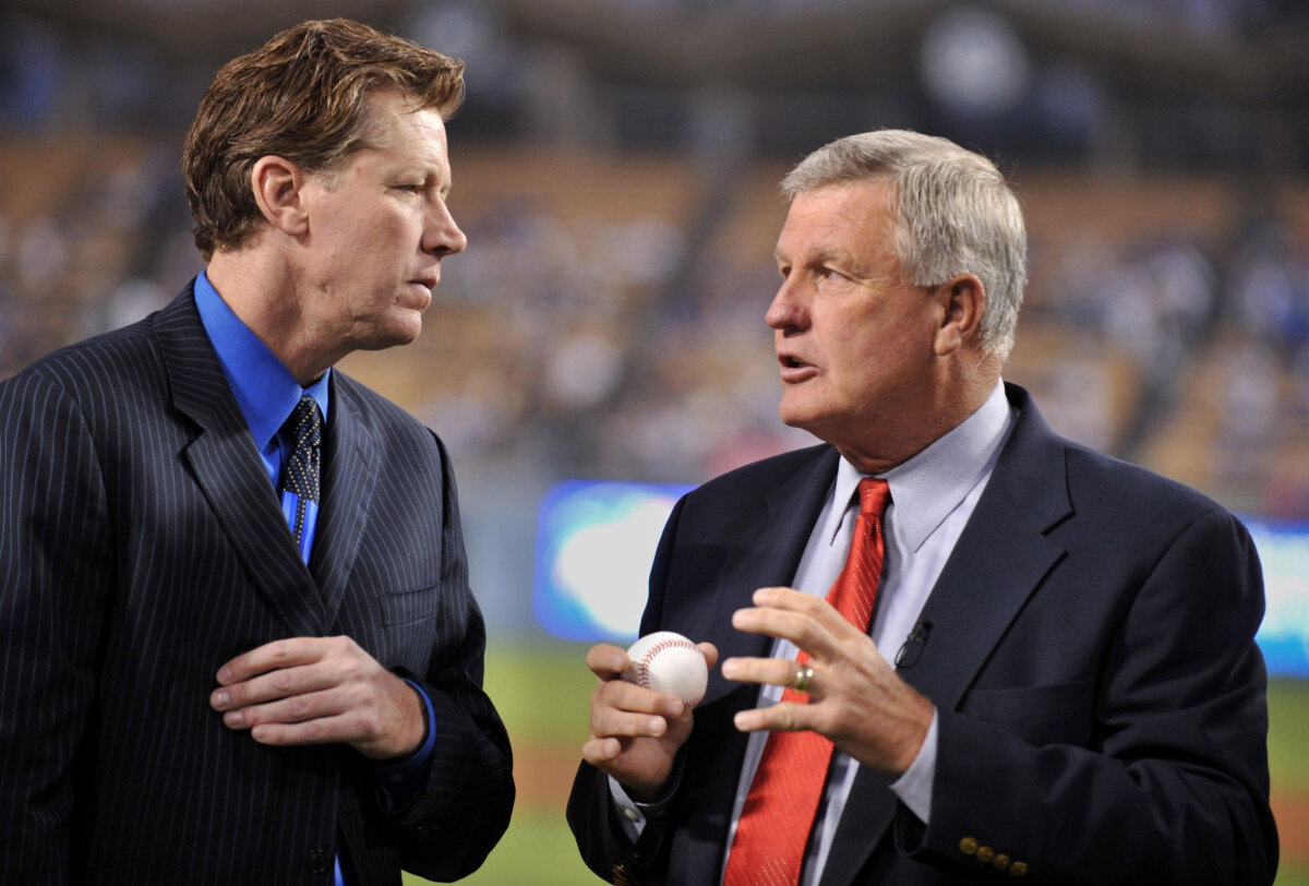 Sep 23, 2008; Los Angeles, CA, USA; Los Angeles Dodgers former players Orel Hershiser (left) and Tommy John talk prior to the game against the San Diego Padres at Dodger Stadium. Mandatory Credit: Kirby Lee/Image of Sport-USA TODAY Sports