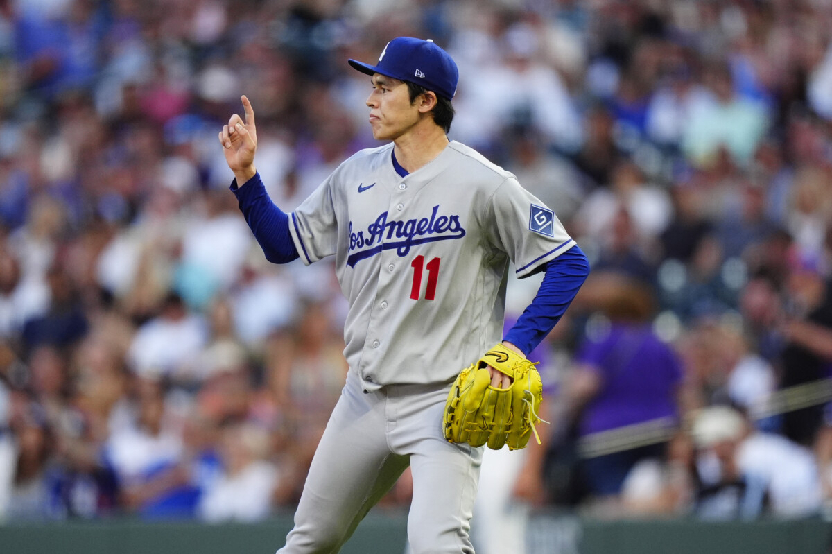Aug 19, 2026; Denver, Colorado, USA; Los Angeles Dodgers pitcher Roki Sasaki (11) reacts to the third out of the during the third inning against the Colorado Rockies at Coors Field. Mandatory Credit: Ron Chenoy-Imagn Images
