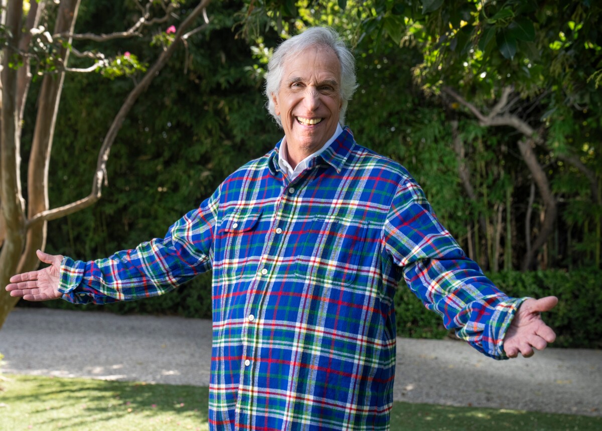 Henry Winkler poses in the front yard of his Los Angeles home. Winkler has a new autobiography: "Being Henry: The Fonz . . .