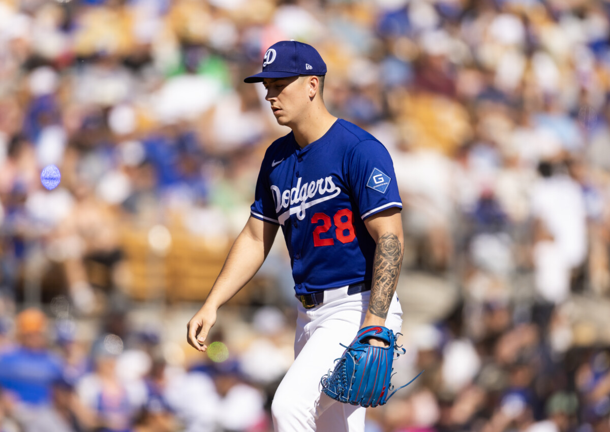 Feb 20, 2025; Phoenix, Arizona, USA; Los Angeles Dodgers pitcher Bobby Miller against the Chicago Cubs during a spring training game at Camelback Ranch-Glendale. Mandatory Credit: Mark J. Rebilas-Imagn Images