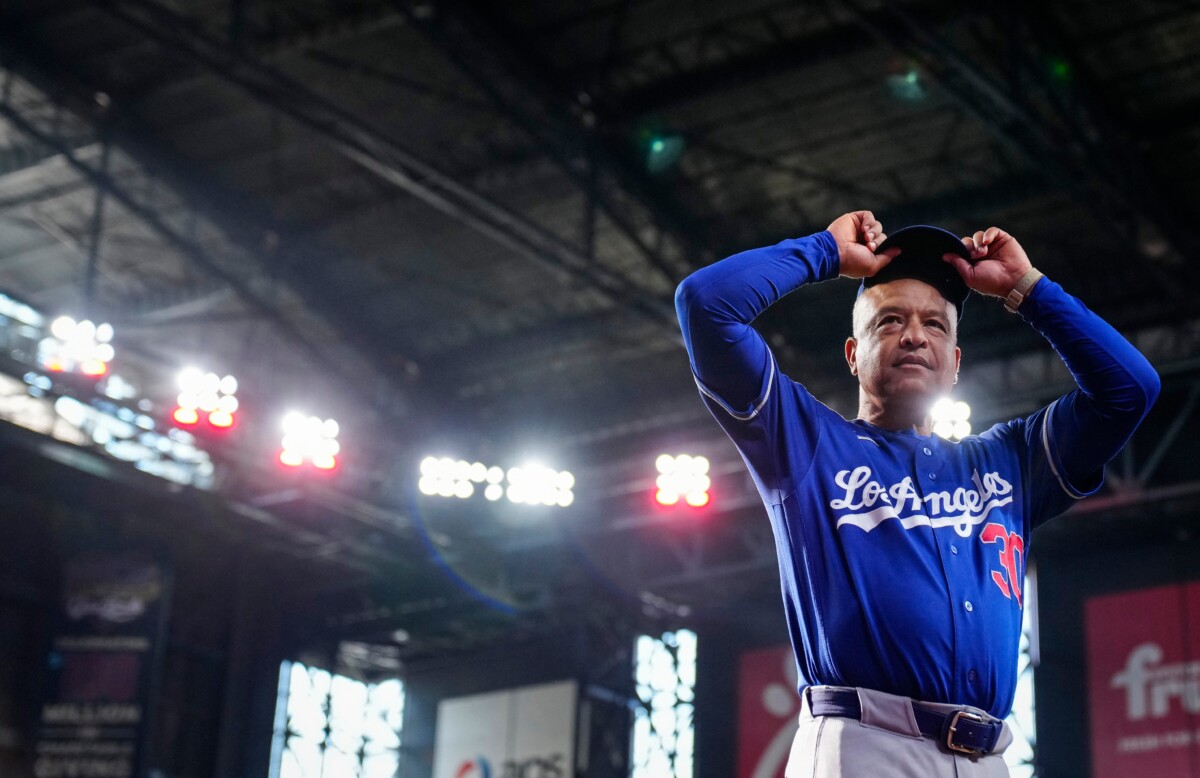 Dodgers manager Dave Roberts (30) looks at the stands prior to a game at Chase Field in Phoenix, on August 8, 2026.