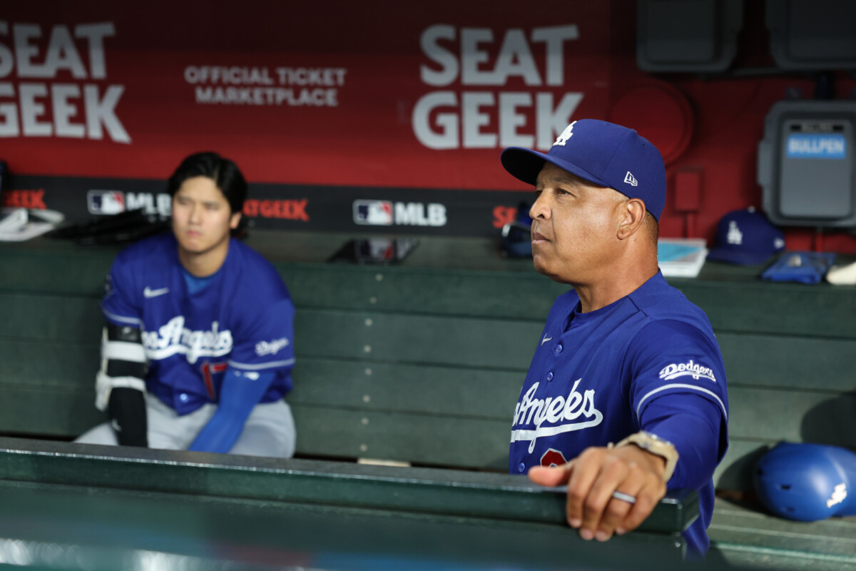 Aug 8, 2026; Phoenix, Arizona, USA; Los Angeles Dodgers manager Dave Roberts (4) looks out to the field before the game against the Arizona Diamondbacks at Chase Field. Mandatory Credit: Anna Carrington-Imagn Images